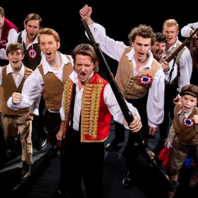 TRENT RICHARDS as Enjolras and ensemble. PHOTO CREDIT Mark Duffus